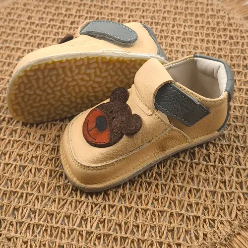 Pantofi barefoot copii primii pași din piele naturală cu talpă flexibilă – galben cu model ursulet- RO-16-23-22-By Pebebe Pantofi barefoot copii primii pași din piele naturală cu talpă flexibilă – galben cu model ursulet- RO-16-23-22-By Pebebe